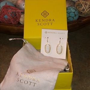 Kendra Scott Elle drop earrings.